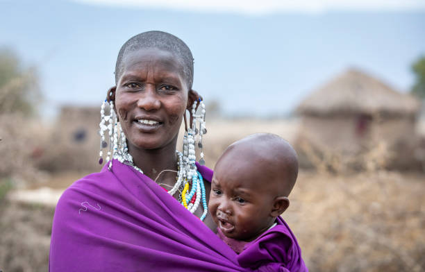 Arusha, Tanzania, 7Th September 2019: maasai woman with a child